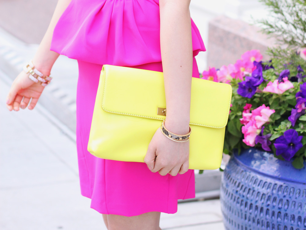 Skirt The Rules Blog; NYC Fashion Blogger; Style Blog; spring outfit photos; Express hot pink peplum dress; J.Crew Factory neon yellow clutch; C. Wonder crystal necklace; J.Crew square pave link bracelet; BaubleBar arrow cuff; C. Wonder snakeskin skinny cuff; Pour La Victoire Mai wedge pumps in nude