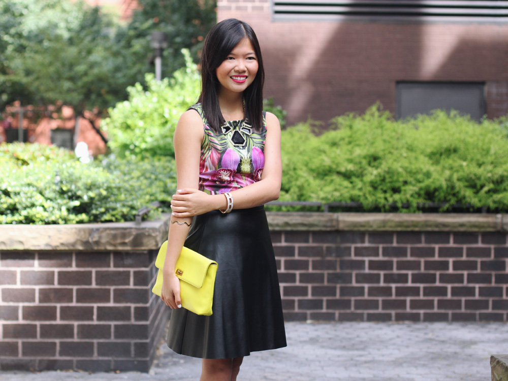 Skirt The Rules Blog; NYC fashion blogger; style blog; fall outfit photo;  Le Tote mirrored floral dress worn as top; Kirna Zabete x Target leather a-line skirt; BaubleBar black geometric statement necklace; J.Crew Factory Vero neon yellow clutch; L.A.M.B. black cut out heels
