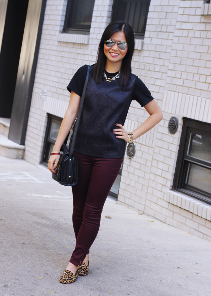Skirt The Rules Blog; NYC fashion blogger; style blog; how to wear oxblood; Topshop snake embossed t-shirt top; Zara oxblood skinny jean leggings; zeroUV black mirror aviators; Sequin art deco necklace; Lipstick Rose Red Riding oxblood bangle bracelet; Forever 21 geometric gold bangle cuff; 3.1 Phillip Lim for Target black crossbody bag; Joie Clothing Dylan leopard studded loafers