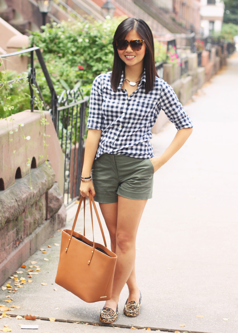 Skirt The Rules Blog; NYC fashion blogger; style blog; how to wear gingham in the fall; J.Crew navy gingham button up shirt; J.Crew olive 3" shorts; BaubleBar bronze geometric necklace; Gigi New York Taylor pebble leather tote; zeroUV designer inspired sunglasses; JewelMint leather wrap bracelet; Joie Dylan leopard loafers