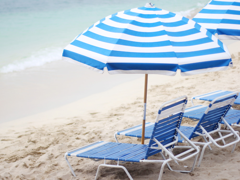 Blue Lounge Chairs at the Beach
